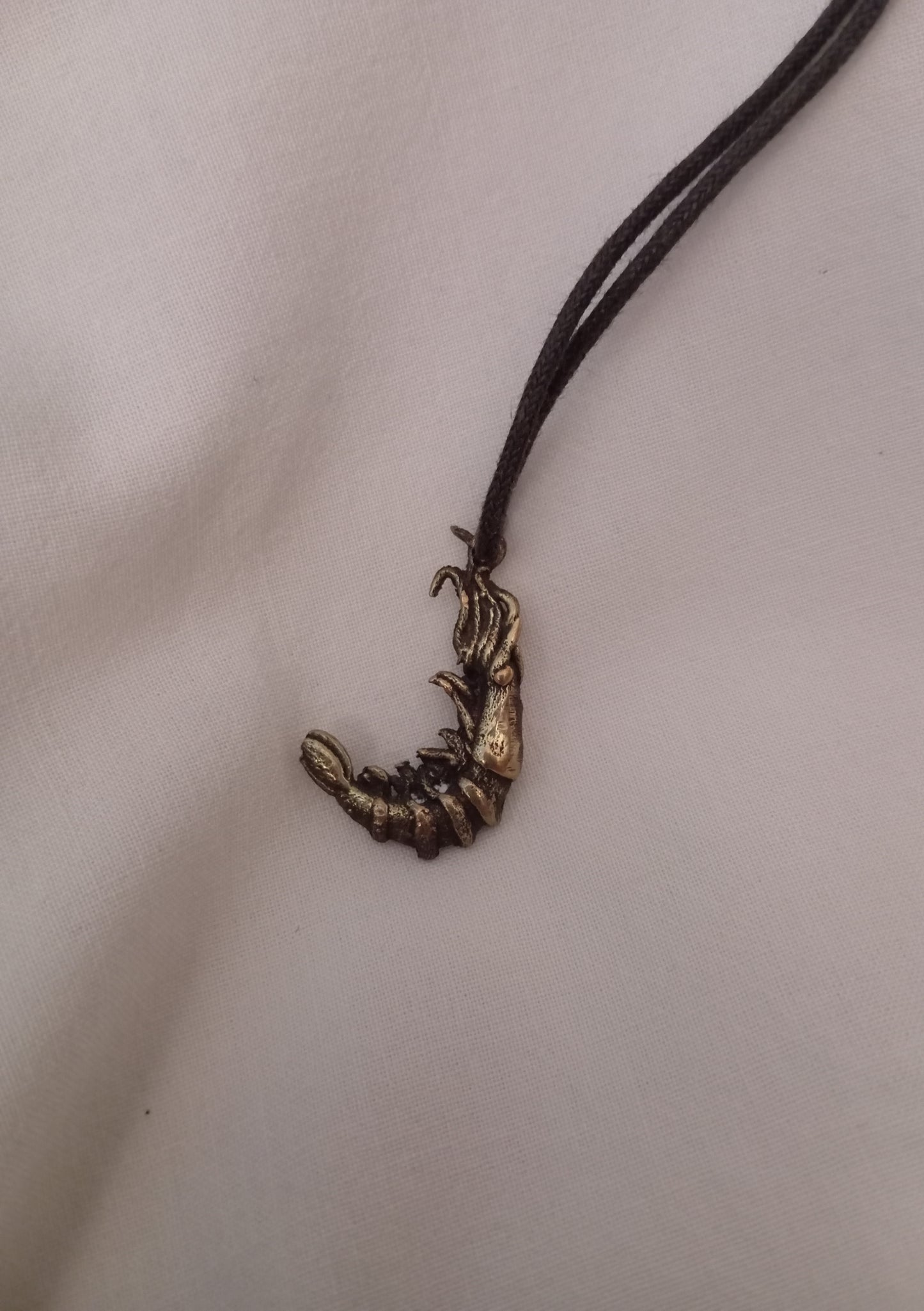 Colgante gamba bronce