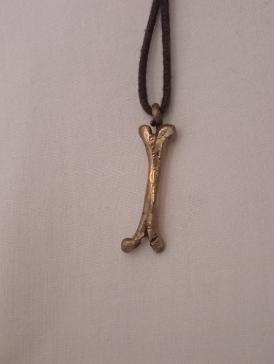 Colgante hueso bronce