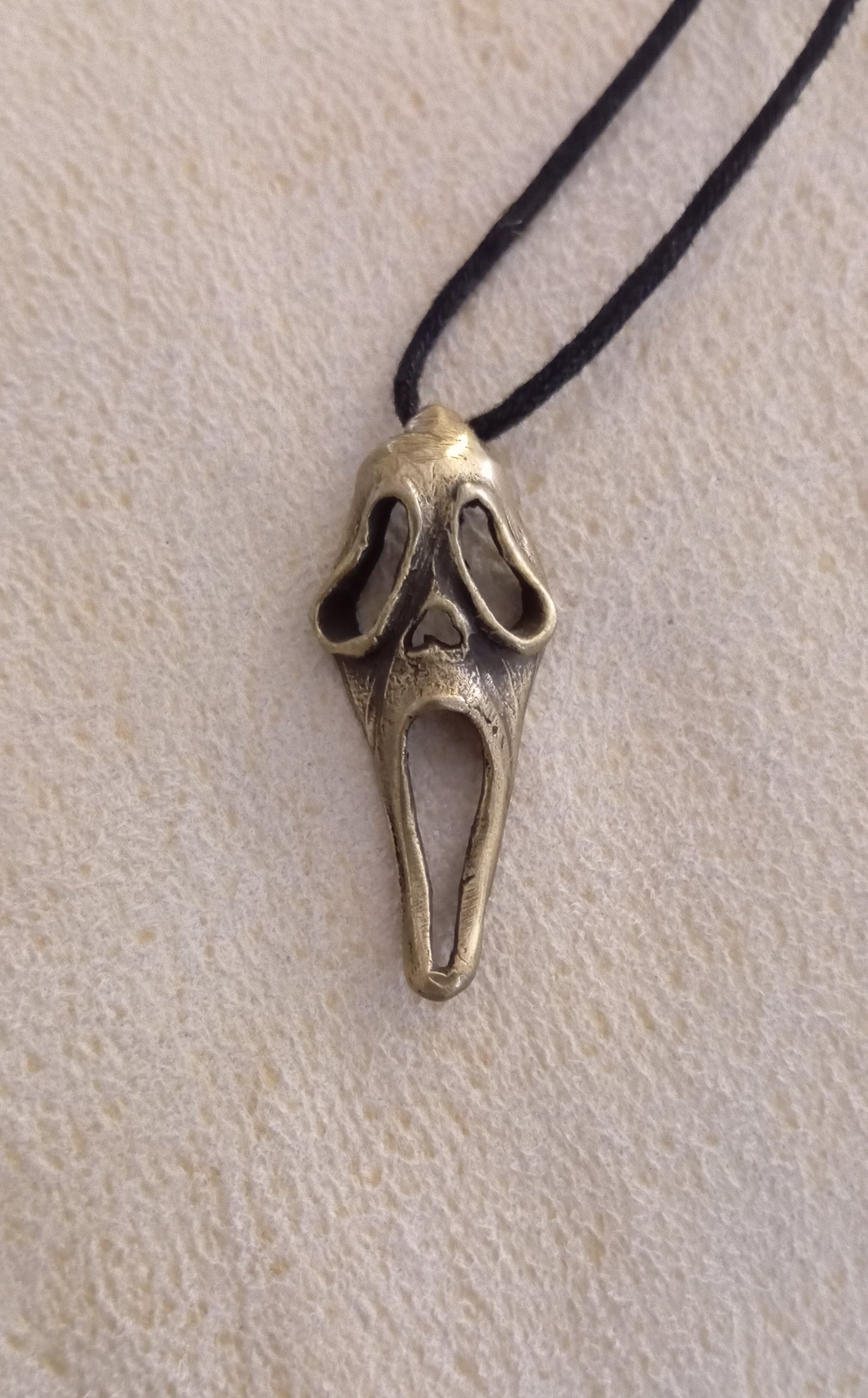 Colgante Scream en bronce