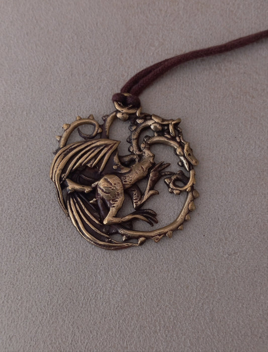 Colgante dragon tres cabezas bronce