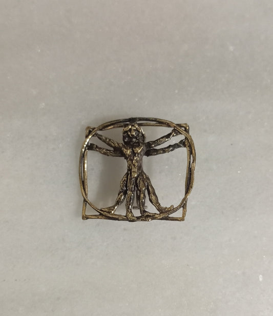 Broche Hombre de Vitruvio en bronce